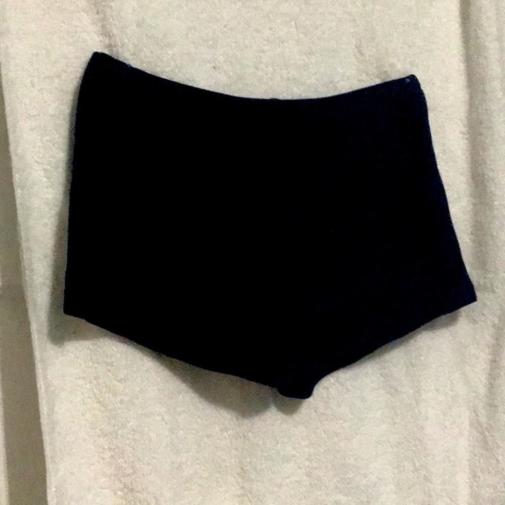 Basic Navy swim suit bottoms that will match most tops featuring Navy blue.